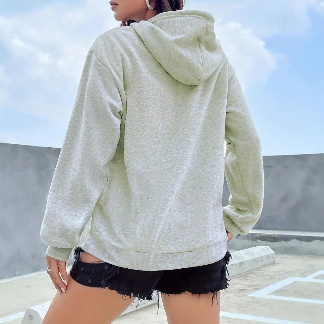 Casual long sleeved printed kangaroo pocket hoodie in black, loose fit, front view