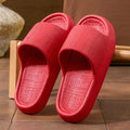 Unisex adult EVA flip flop slippers with toe ring and non-slip sole in multiple colours.