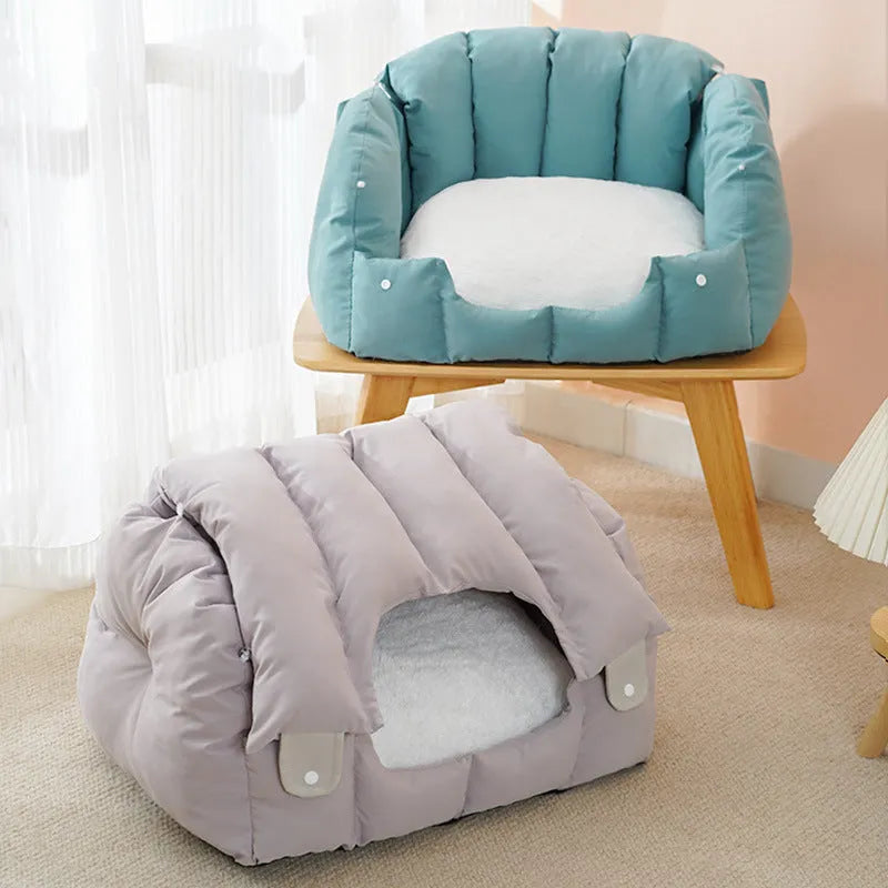 Grey arched fully enclosed cat nest bed with soft sofa exterior, shown next to a green one.