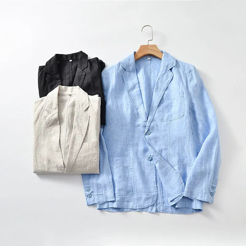 Men's solid colour linen suit blazer with side stick pockets, shown in light blue.