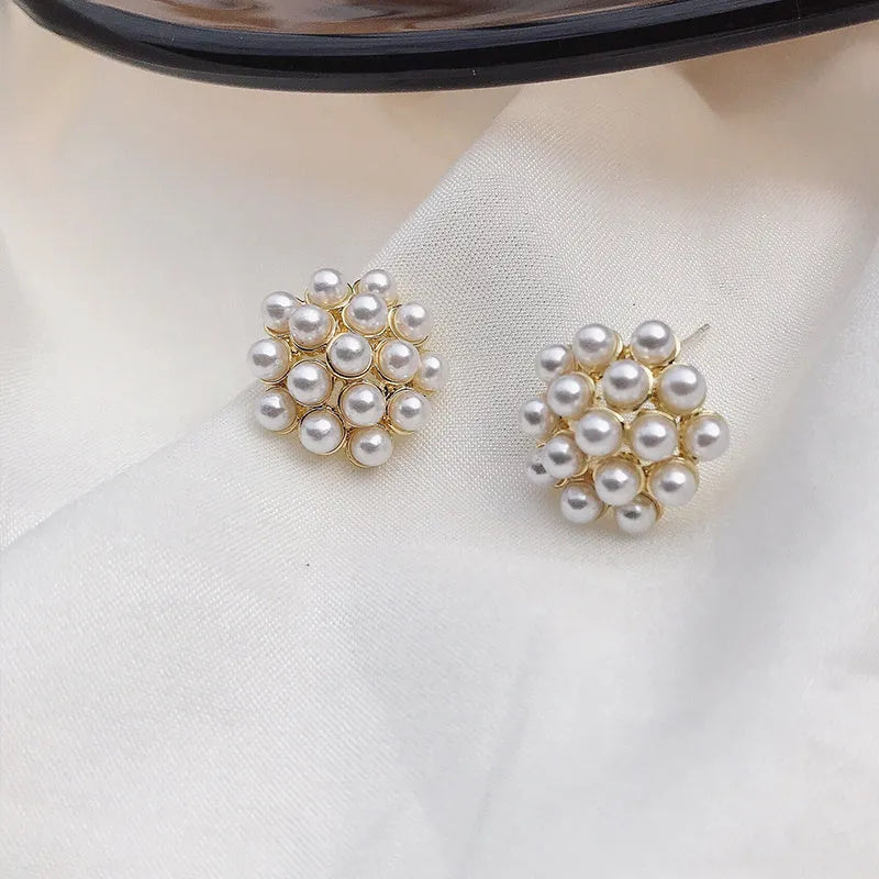 Korean style alloy earrings with pineapple and starfish motifs in gold colour, featuring inlaid artificial gems