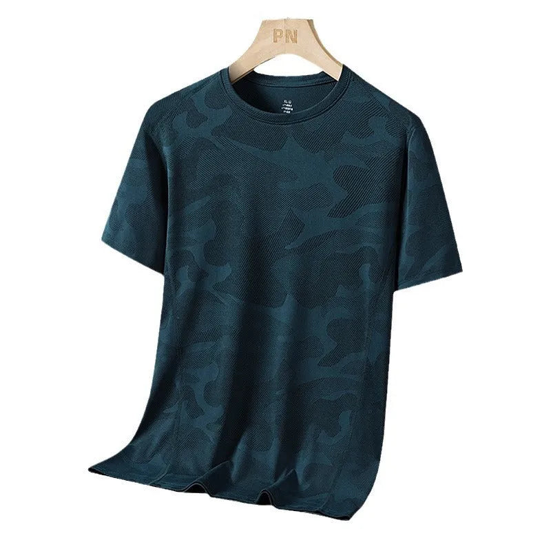 Plus size men's camouflage print short sleeve top in nylon fabric on a hanger.