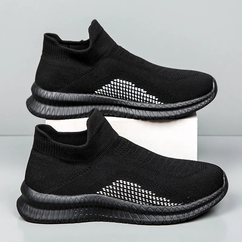 Men's white Popcorn Flyknit low-top casual sneaker on a solid background.