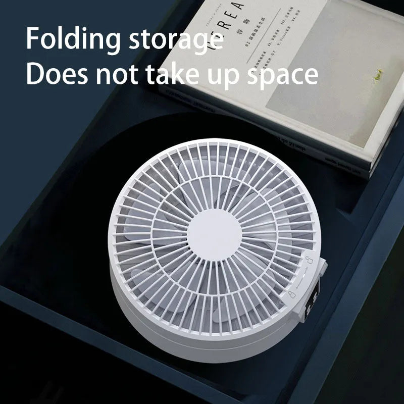 White portable rechargeable folding fan with remote control and night light shown in desktop and wall-mounted positions