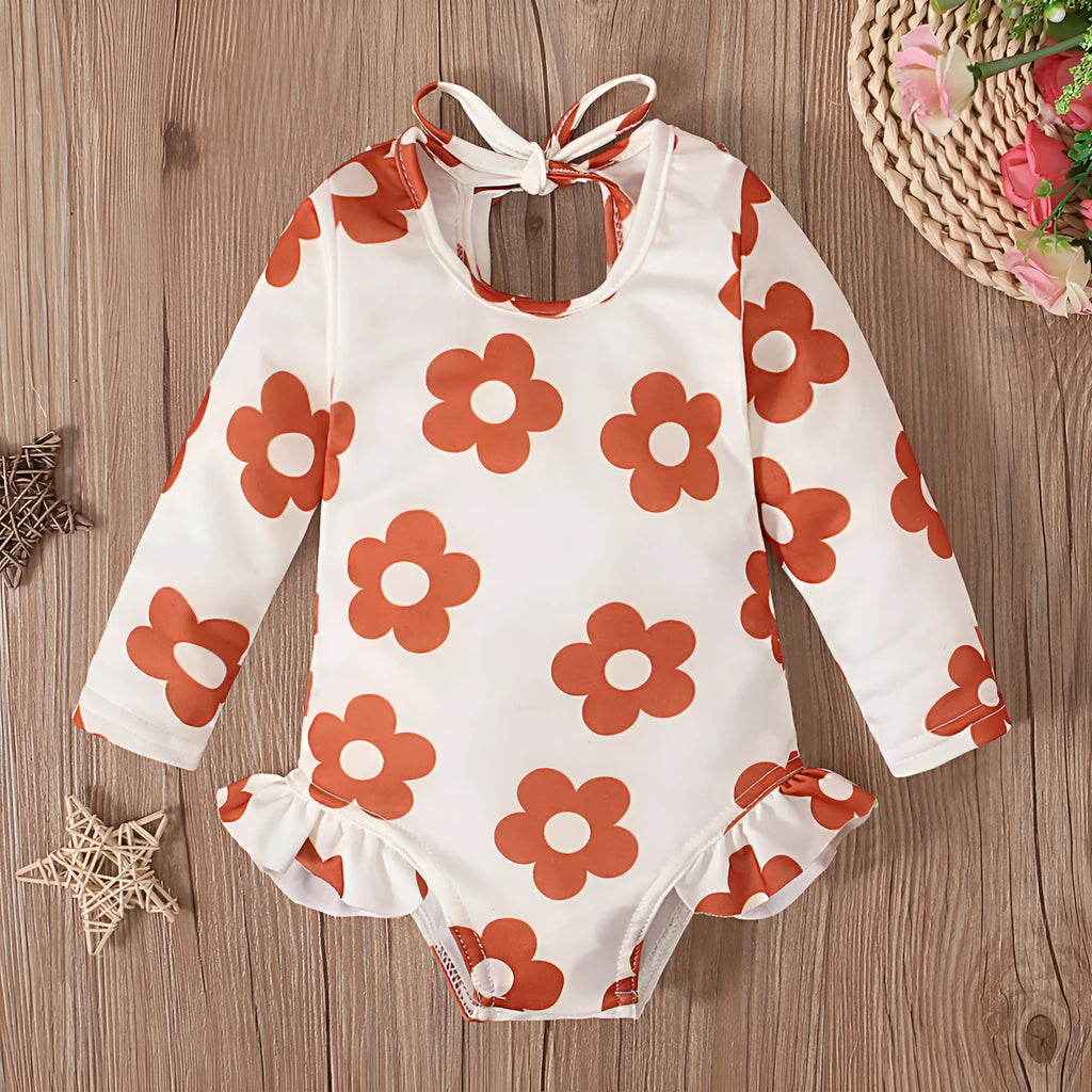 Girl's floral pattern open back swimsuit in orange red, available in sizes 70 to 110 yards.