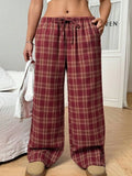 Women's loose fit casual trousers with drawstring waist and plaid pockets in polyester fabric