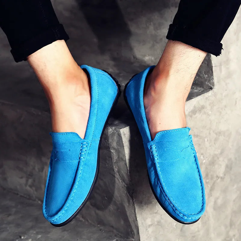 Men's suede leather Gommino-style slip-on casual shoes in brown, shown from the side.