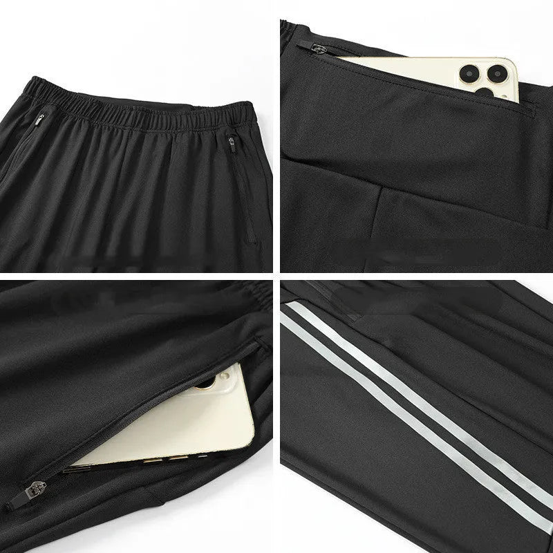 Men's black polyester running trousers with a mid waist fit on a size chart.