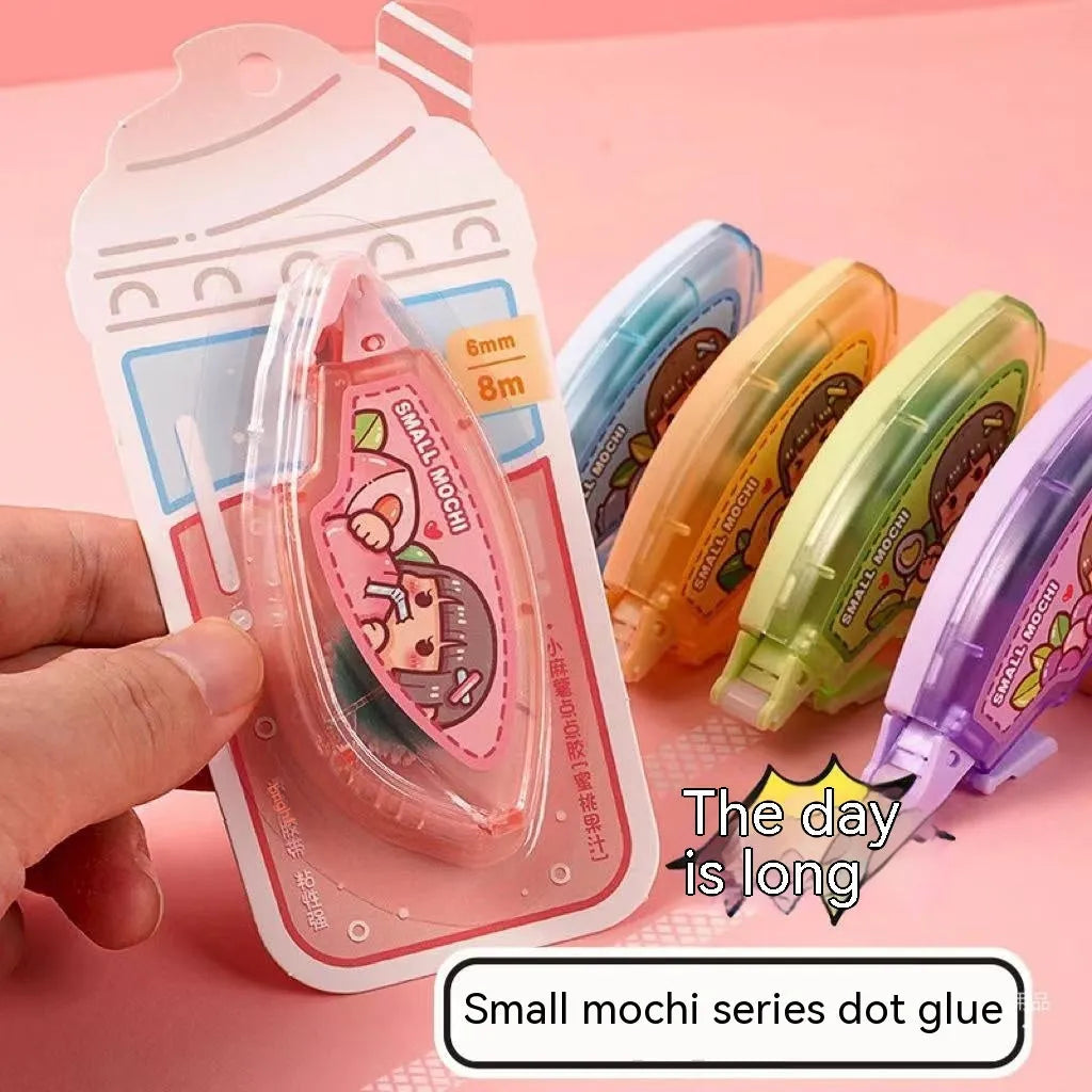 Dotting glue in fruit juice colours including peach, lemon, blueberry, butter, and grape on card packaging