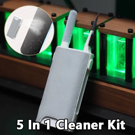 5-in-1 digital cleaning kit with black body, showing flocking sponge, brush, and metal tip for phones and earphones.