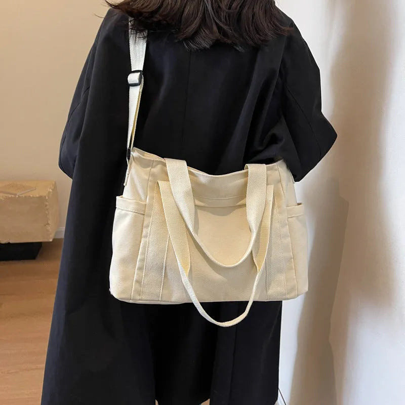 Large capacity polyester canvas shoulder tote bag with external pocket and phone compartment
