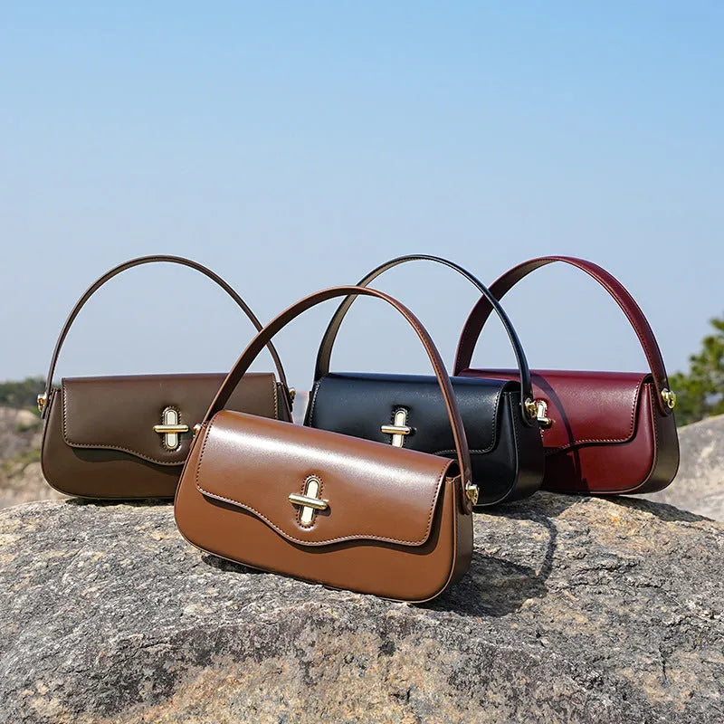 26cm wide genuine leather women's handbag in horizontal square shape with clamshell opening and double shoulder straps