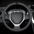 Black steering wheel cover with two-colour stitching, showing napa leather texture and a 38cm diameter.