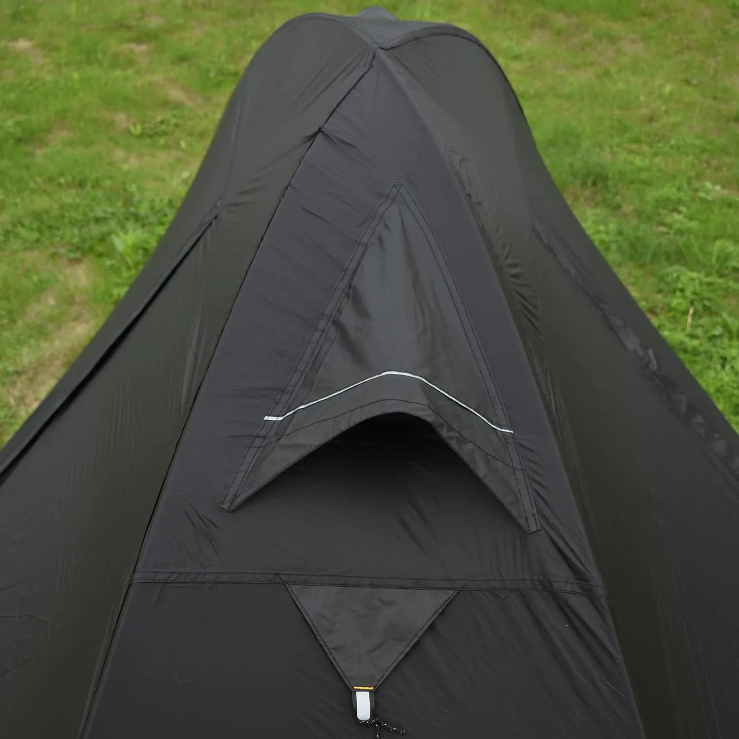 Single person lightweight tent in red colour with aluminium poles, shown expanded.