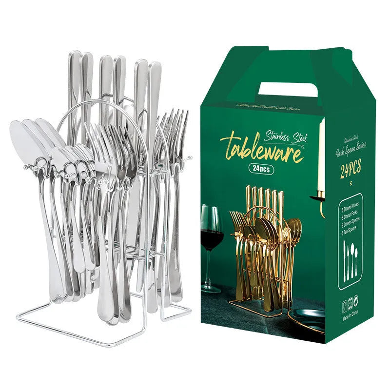Gold 24-piece stainless steel cutlery set with knives, forks, spoons, and a storage rack.