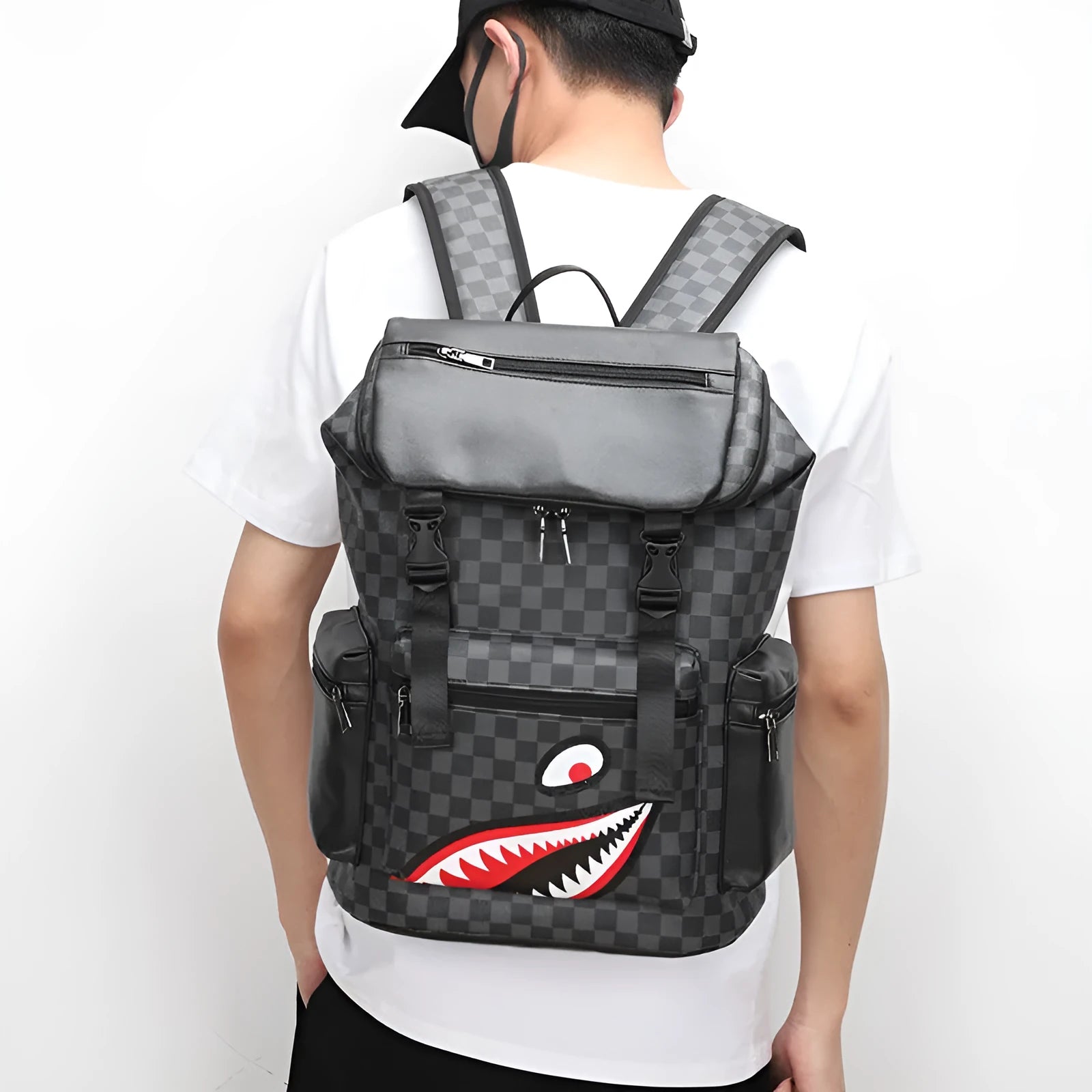 Korean style casual checkered printed backpack in black PU leather with curved shoulder straps.