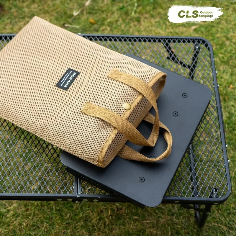 CLS Outdoor aluminium folding camping stool shown in table and stool modes with creamy-white PU cushion and storage bag.