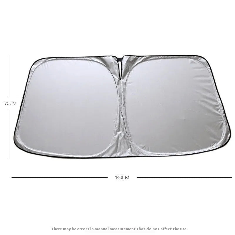 Aluminium foil car sunshade showing titanium silver colour, folded concertina-style.