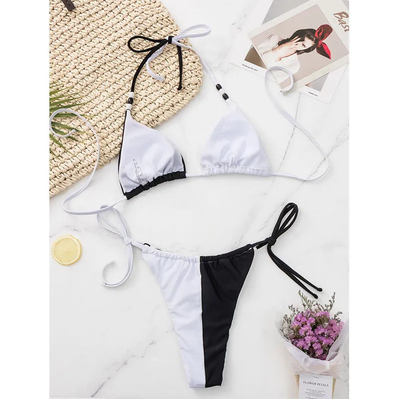 Black and white women's lace-up triangle cup bikini swimsuit set