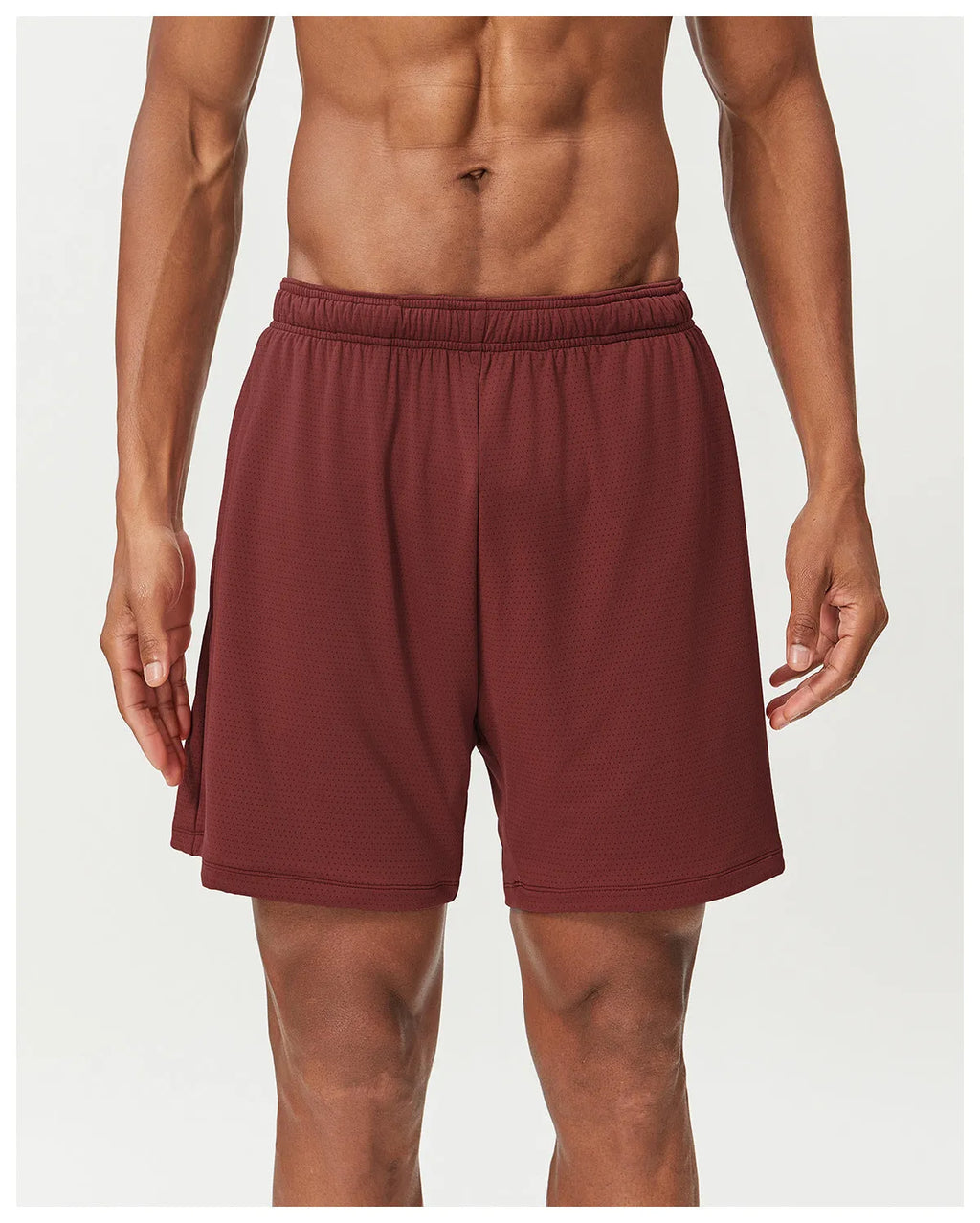 Men's double-layer quick-dry running shorts in brick red colour on a mid-waist fit model.