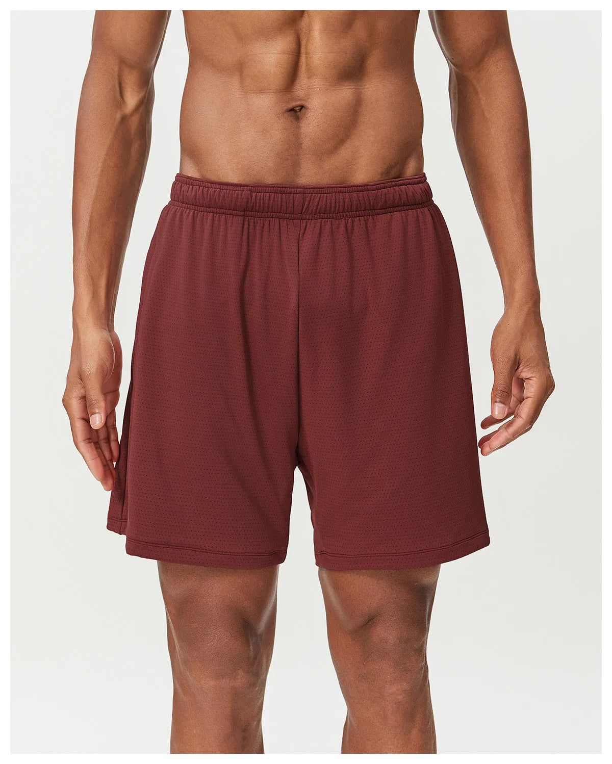 Men's double-layer quick-dry running shorts in brick red colour on a mid-waist fit model.