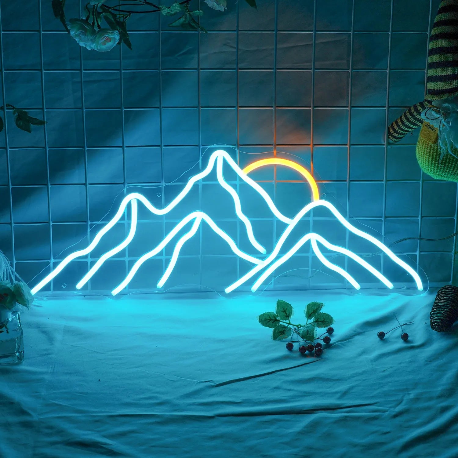 Mountain shape acrylic LED neon light with sunrise colour effect on a wall