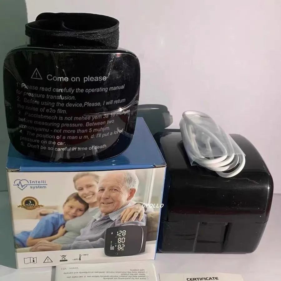 Black wrist blood pressure monitor with USB charging cable