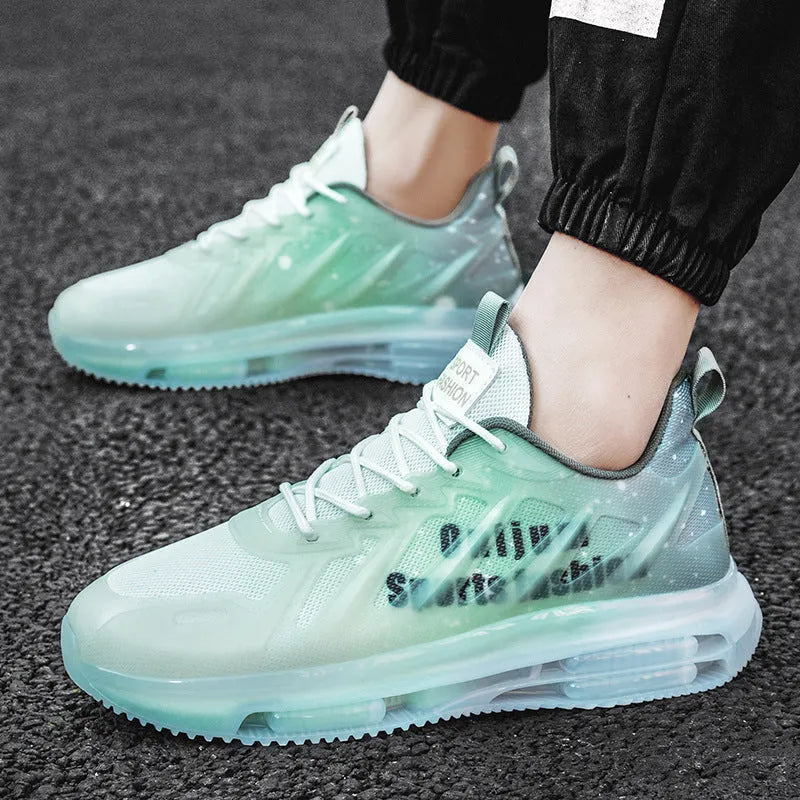 Men's black and green heightened casual shoes with a platform sole and mesh upper.