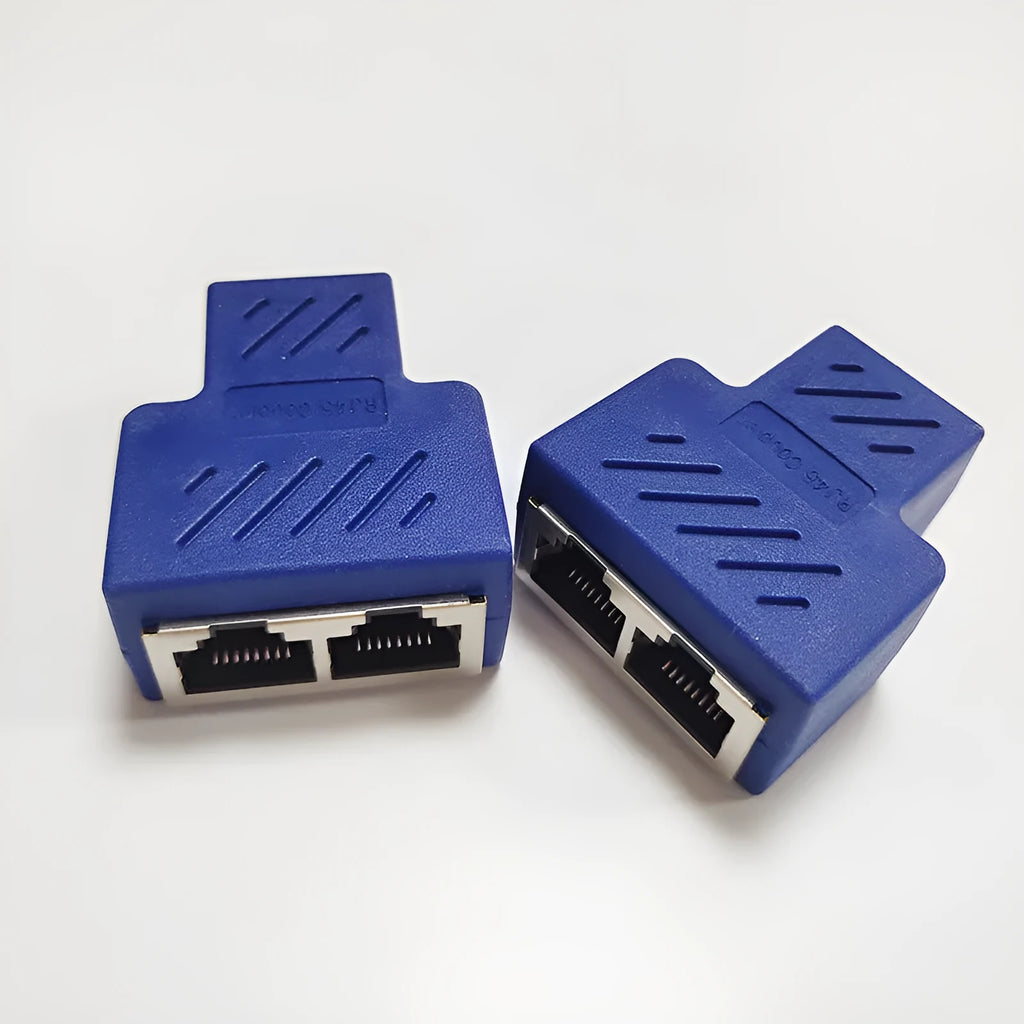 White RJ45 three-way network cable splitter adapter on a black background.