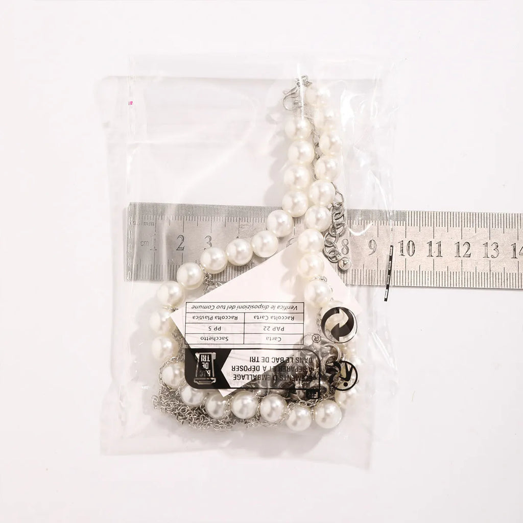 Women's double-layer retro necklace with white K electroplated finish, iron pendant, and imitation pearl tassel design