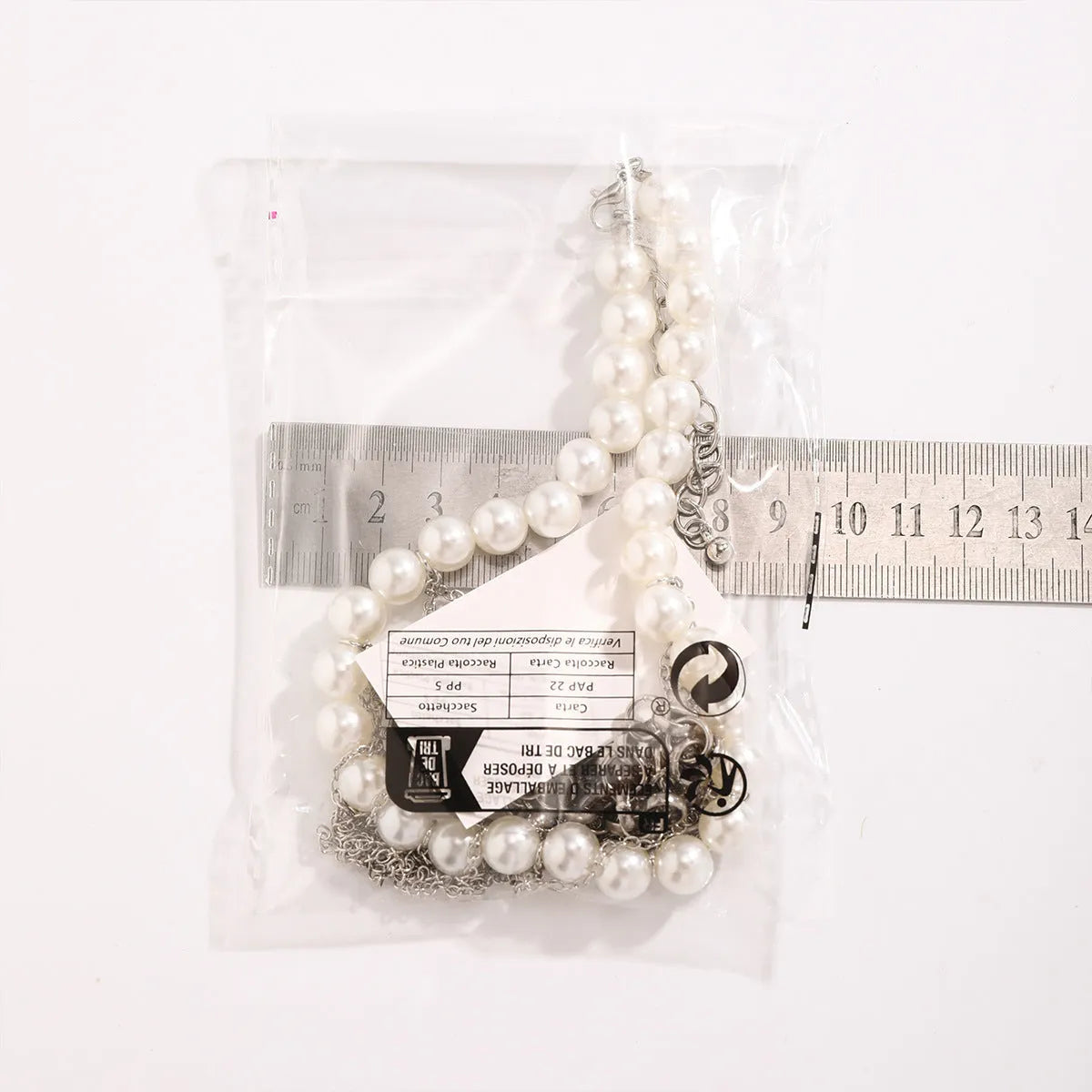 Women's double-layer retro necklace with white K electroplated finish, iron pendant, and imitation pearl tassel design