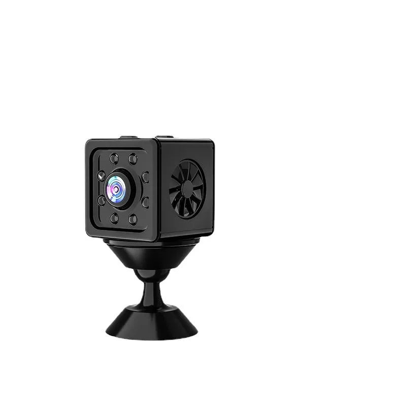 Black cubic network camera on a mounting bracket for indoor HD video monitoring.
