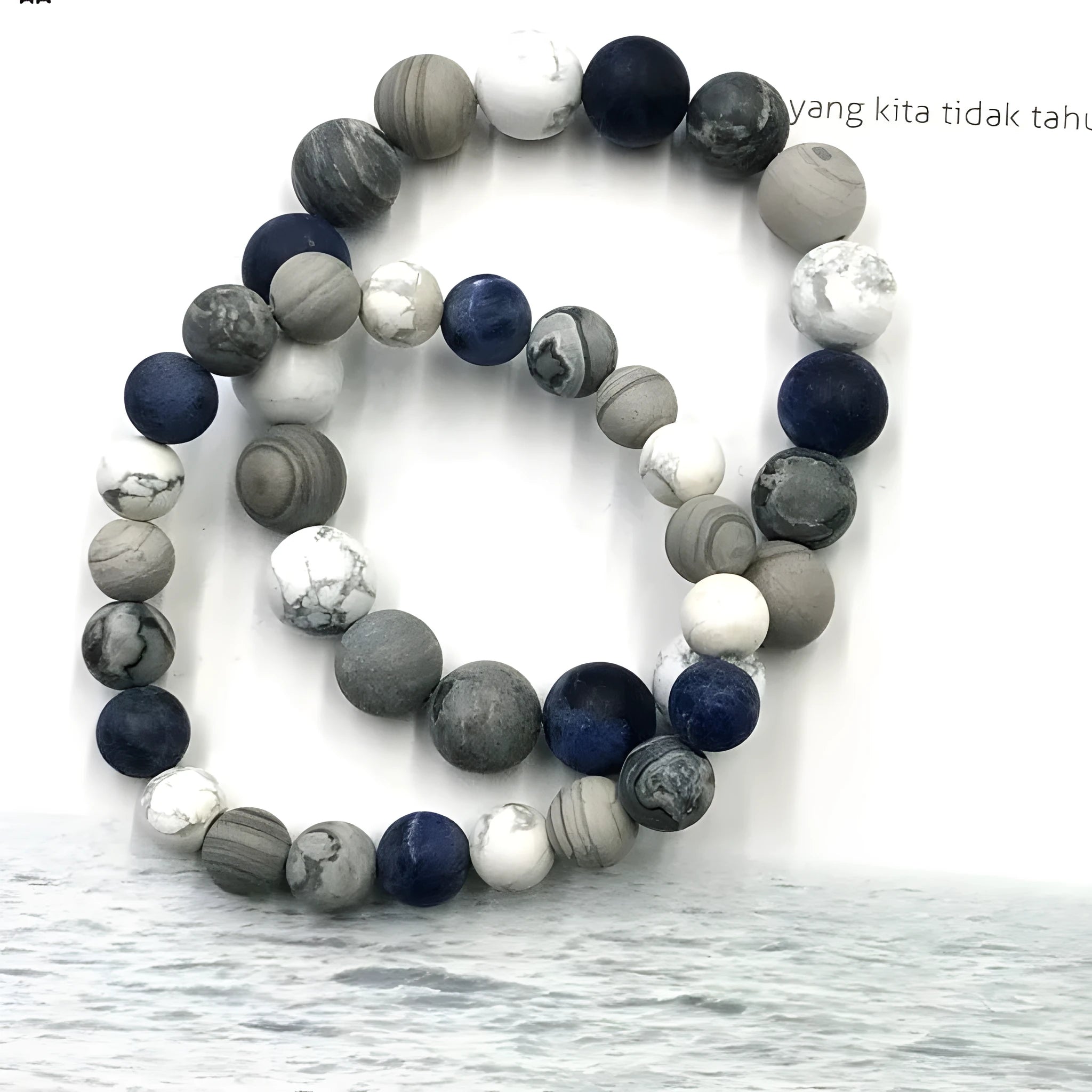 Handmade unisex U-shaped bracelet with natural planet stone beads in 8mm, 10mm, or 12mm sizes.