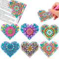 Set of six PU leather handmade bookmarks with flower cornerite shapes and stick-on crystals.