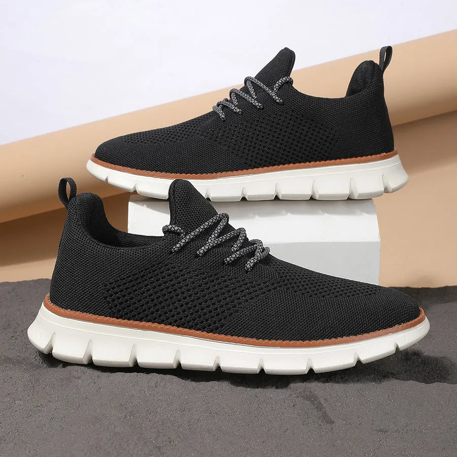 Men's casual sneaker with mesh upper in black or grey colour with round toe design