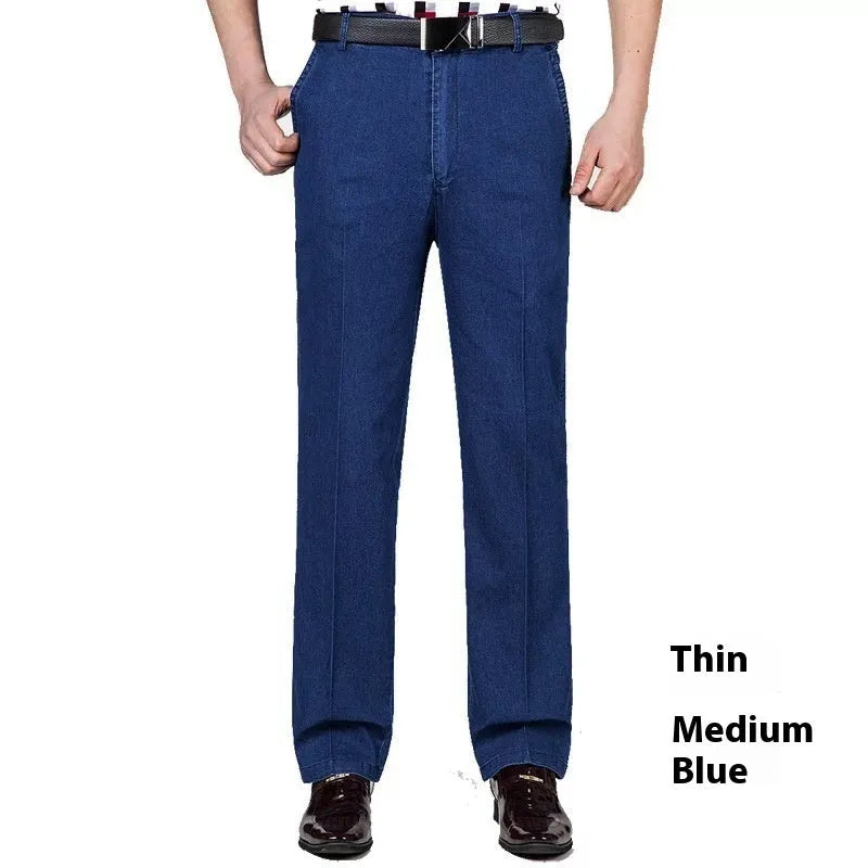 Men's high waist loose fit blue denim jeans on a neutral background
