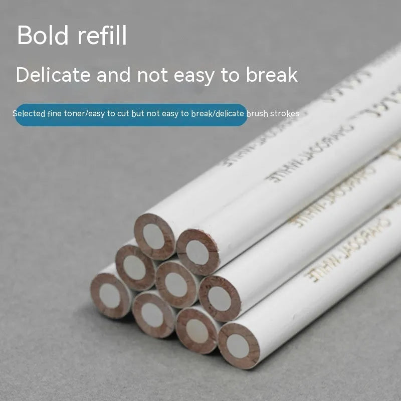 Three white charcoal sketching pencils with wooden casings and a visible refillable brush tip.