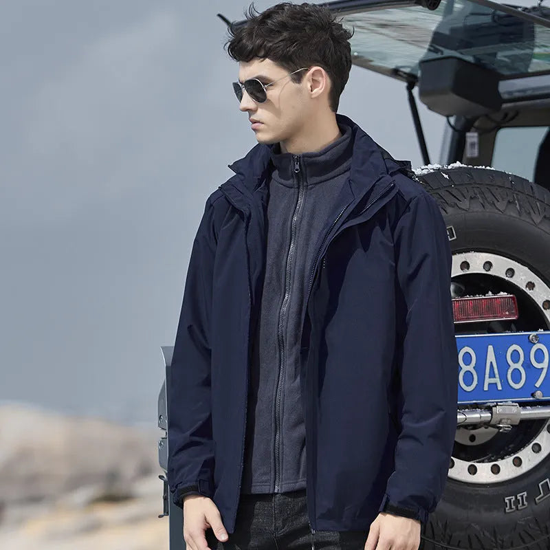 Men's black three-in-one removable waterproof mountaineering suit with polar fleece lining shown for hiking.