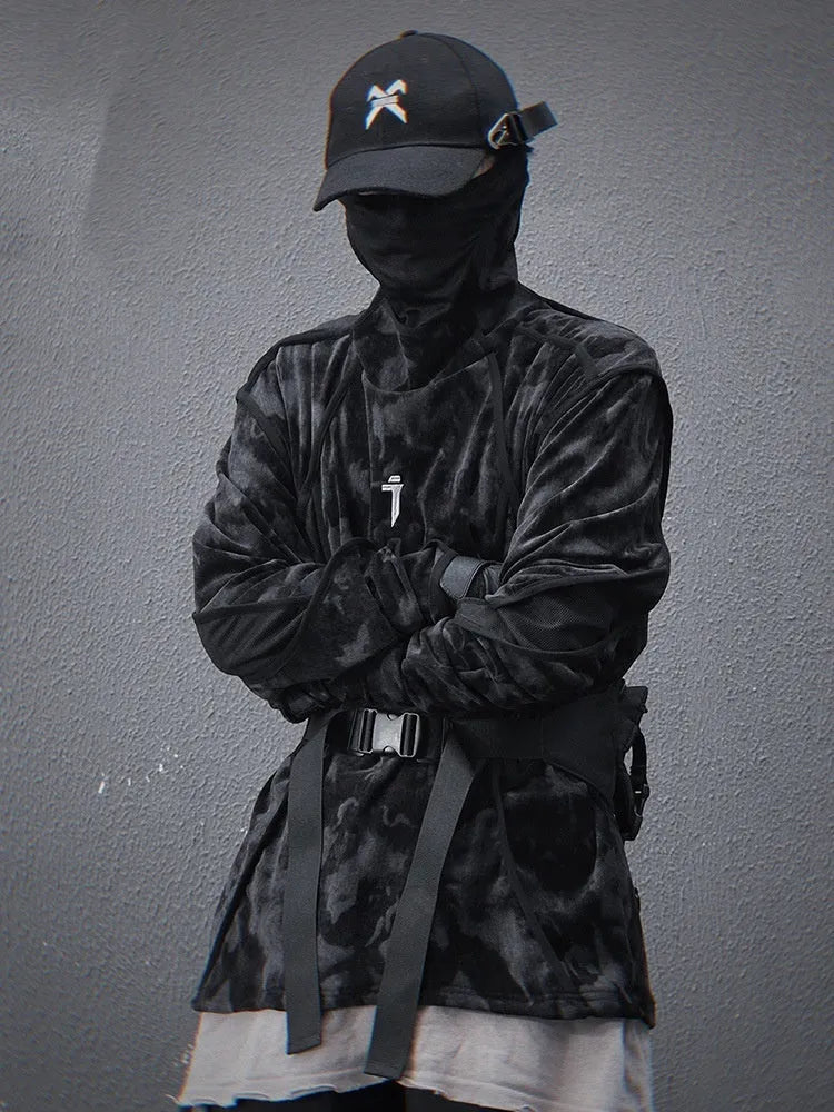 Man modelling a black and grey tie dye print loose fit pullover sweater with drop shoulders.