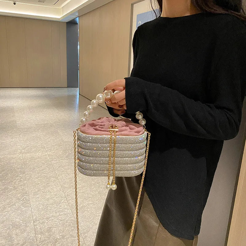 Soft round PU women's crossbody dinner bag with beaded details in retro style.