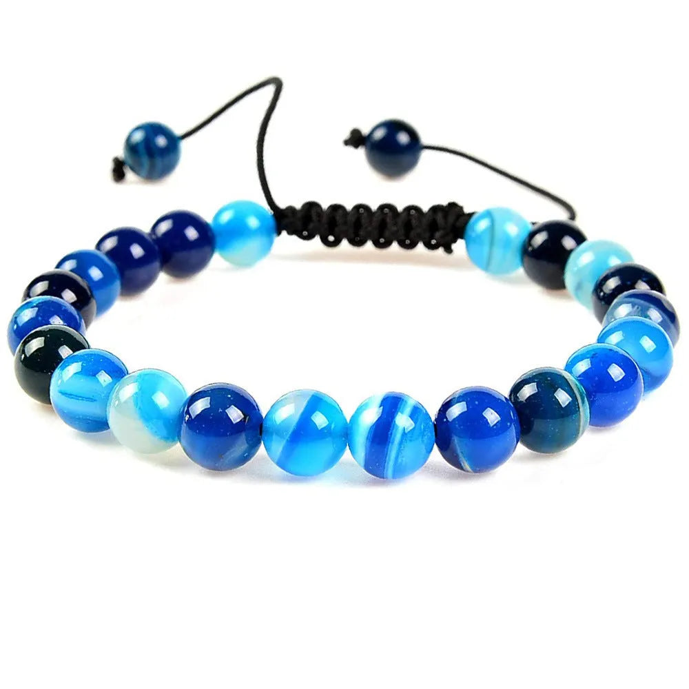 Women's flat knot braided bracelet hand-woven from aquamarine stone with geometric patterns.