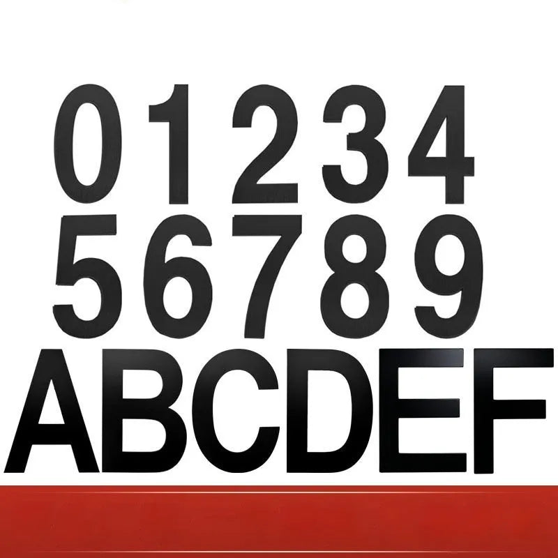 Black stainless steel sticky house number sign measuring 7.5cm with self-adhesive backing.