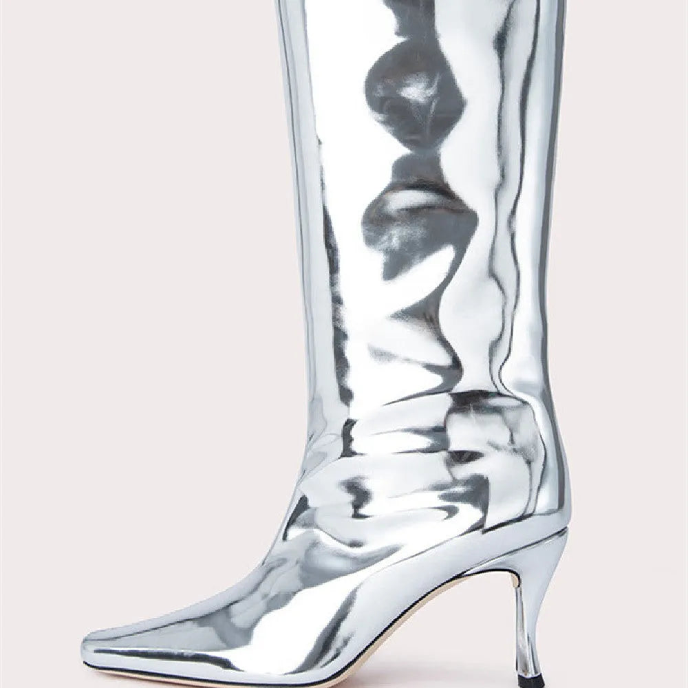 Women's black square toe cowboy boot with microfiber upper on a wooden background.
