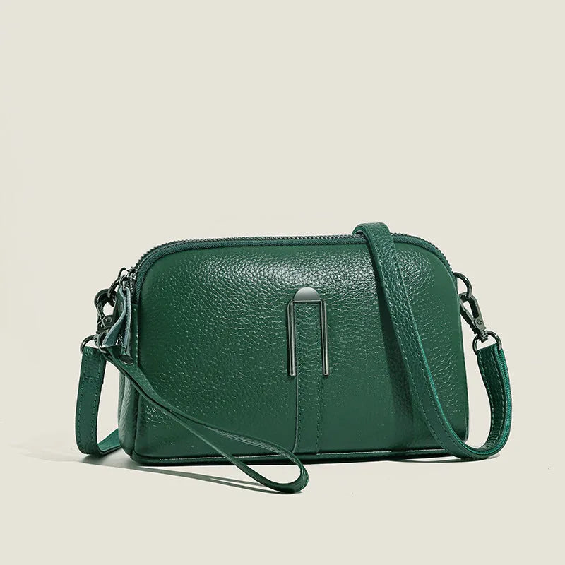 Women's black genuine leather shoulder bag showing square shape and compact 19x13x6cm size