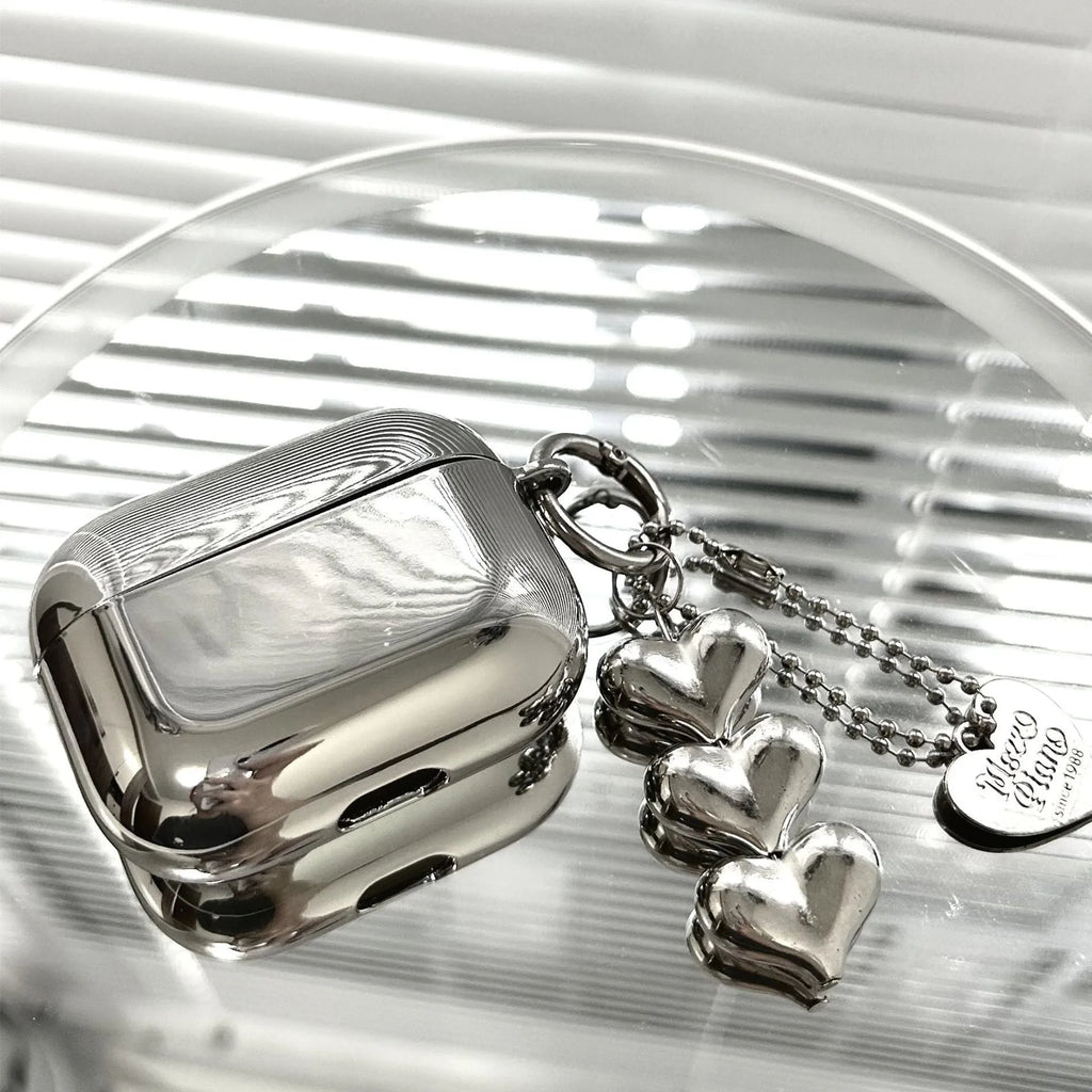Electroplated solid colour TPU AirPods case with heart pendant charm and chain attachment