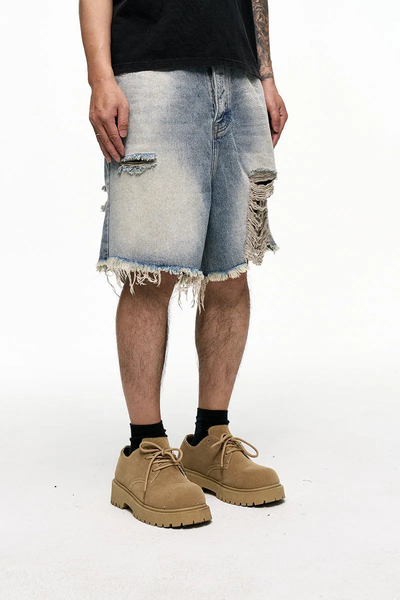Light blue men's baggy denim shorts with wide leg cut and retro washed finish