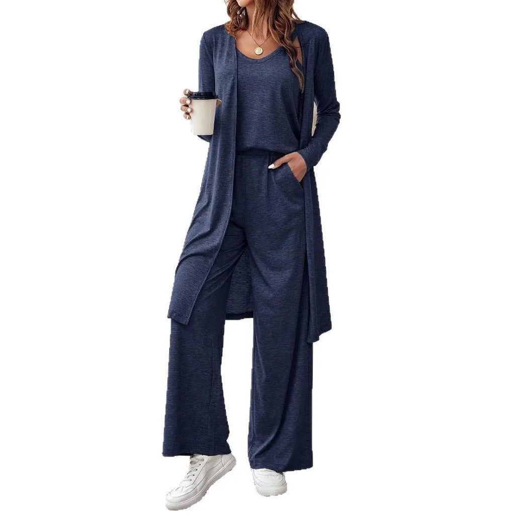 Blue women's three-piece casual suit set with sling top, cardigan, trousers, and suspenders on a hanger.