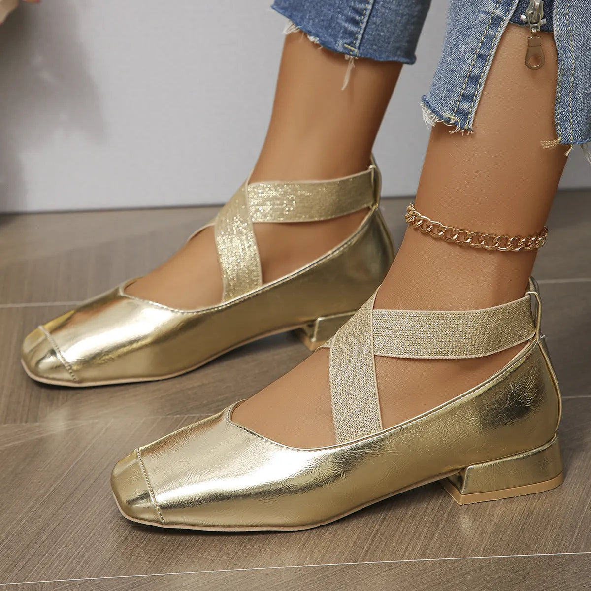 Slip-on square-toe evening pumps in black, gold, or silver with a low rubber sole heel.