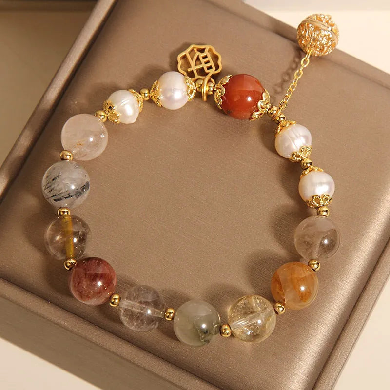 Women's adjustable crystal pearl bracelet with four pearls and Chinese Cai charm in natural hair colours