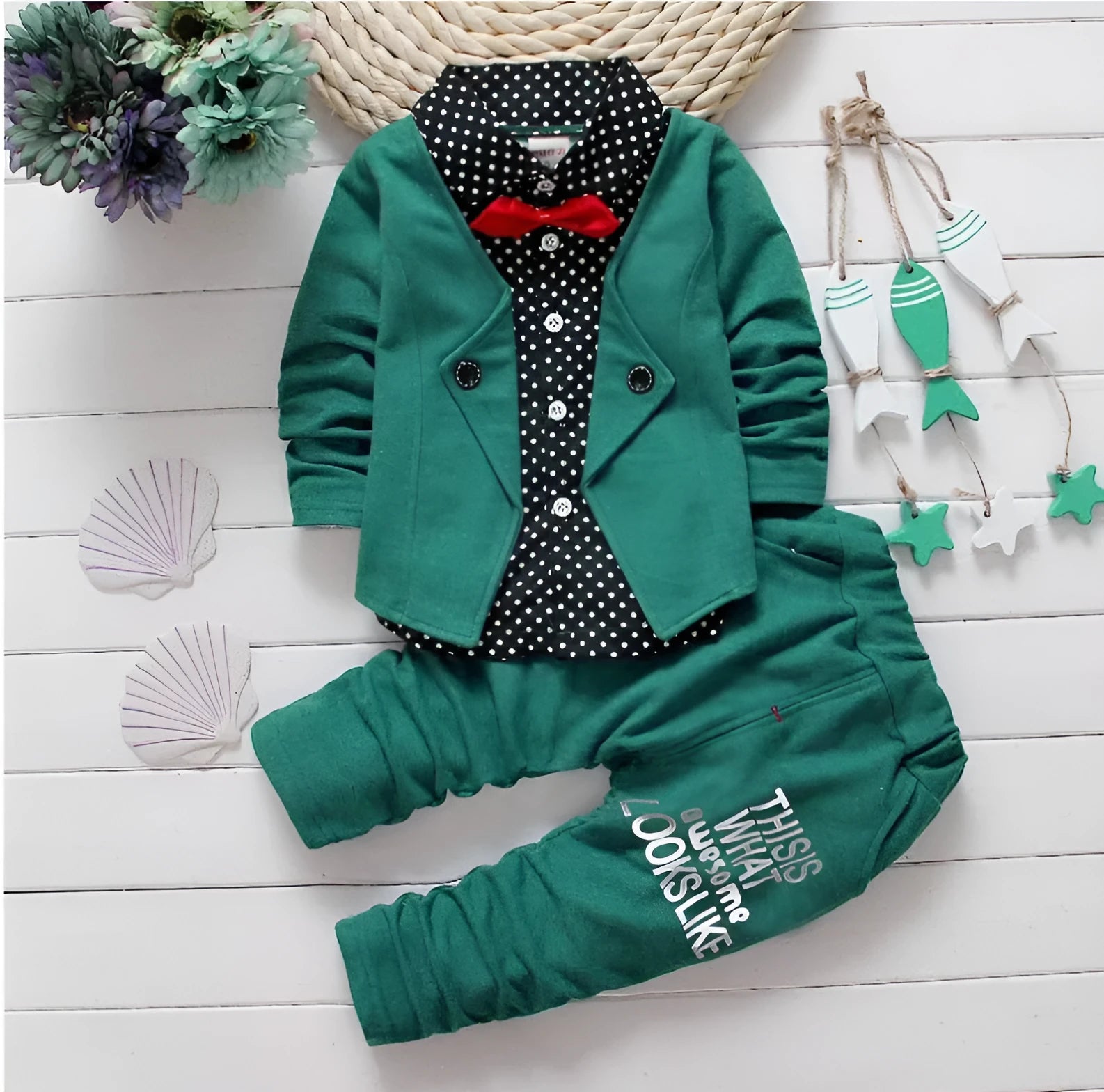 Casual blue kids sport suit consisting of a short-sleeved top and long trousers on a child mannequin.